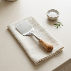 Steel spoon with a wooden handle