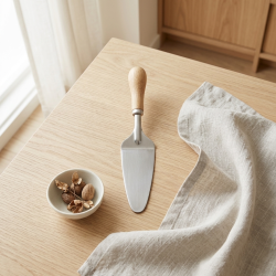 Steel spoon with a wooden handle